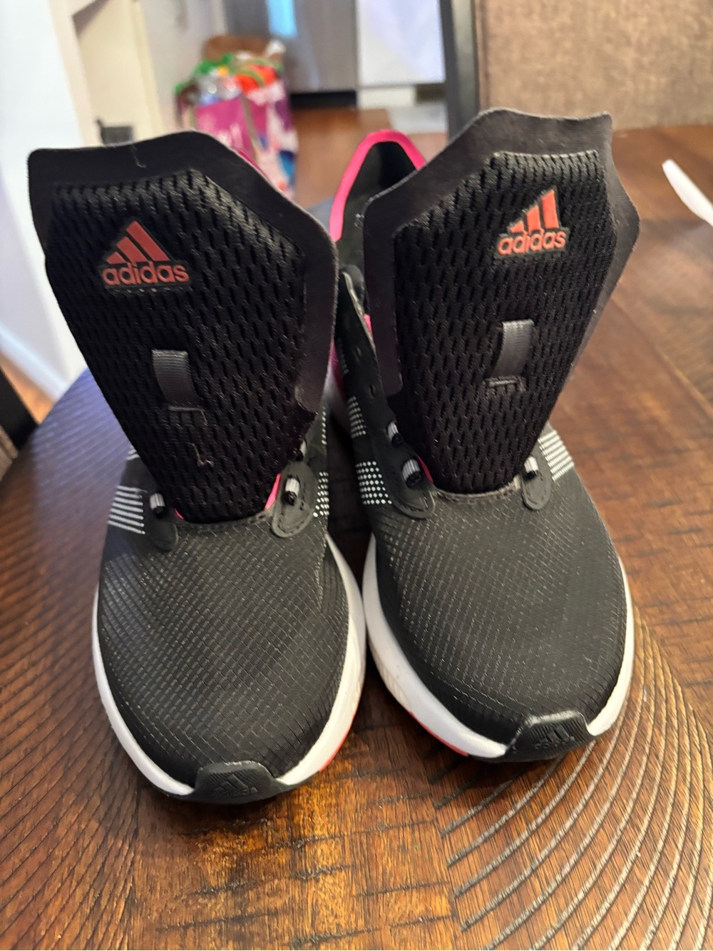 Gently Used Adidas Ladies Black Sneakers with Pink Accents (laces are missing)